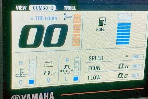Slide: The Image of Yamaha display panel on 2018 Ranger Tugs R-27 showing fuel, speed, and engine metrics. - 28