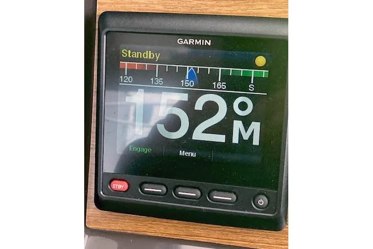 Slide: The Image of Garmin display on 2018 Ranger Tugs R-27 showing heading of 152 degrees. - 29