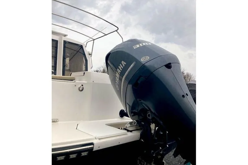 Slide: The Image of 2018 Ranger Tugs R-27 with Yamaha 300 outboard motor, rear view. - 5
