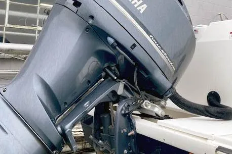 Slide: The Image of 2018 Ranger Tugs R-27 with Yamaha outboard motor, close-up view. - 6