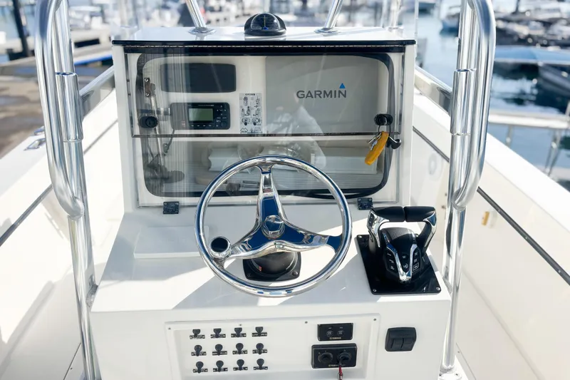 Slide: The Image of Whitewater boat console with Garmin system, docked at marina, 2016 model. - 15