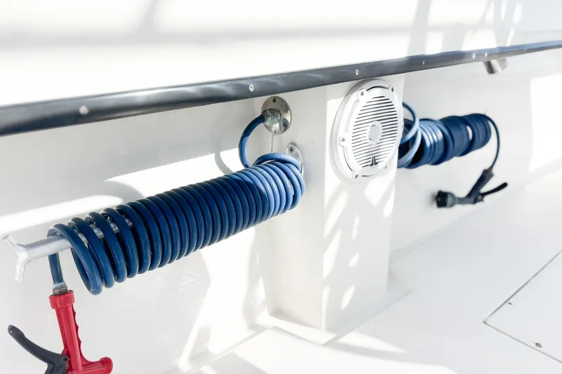 Slide: The Image of Garmin marine electronics setup in a 2016 Whitewater boat, featuring wiring and connectors. - 26