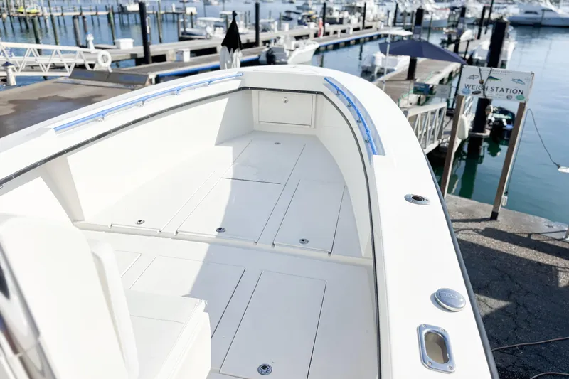 Slide: The Image of Whitewater 2016 boat at marina with Garmin navigation system, docked near waterfront. - 3
