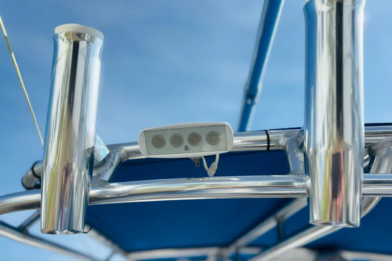 Slide: The Image of Stainless steel boat frame with mounted light, under clear blue sky, Whitewater 2016. - 42