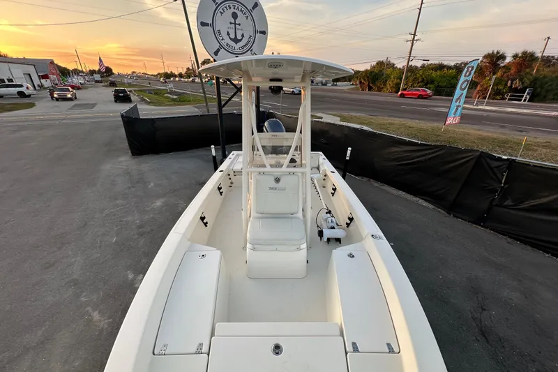 Slide: The Image of 2015 Pathfinder 2200 TRS boat on trailer under clear blue sky. - 10