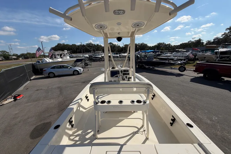 Slide: The Image of 2015 Pathfinder 2200 TRS boat console with steering wheel and navigation equipment. - 17