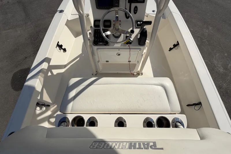 Slide: The Image of Dashboard of a 2015 Pathfinder 2200 TRS boat showing tachometer and speed fuel gauges. - 21