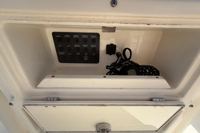 Slide: The Image of 2015 Pathfinder 2200 TRS boat deck with storage compartments and trolling motor. - 32