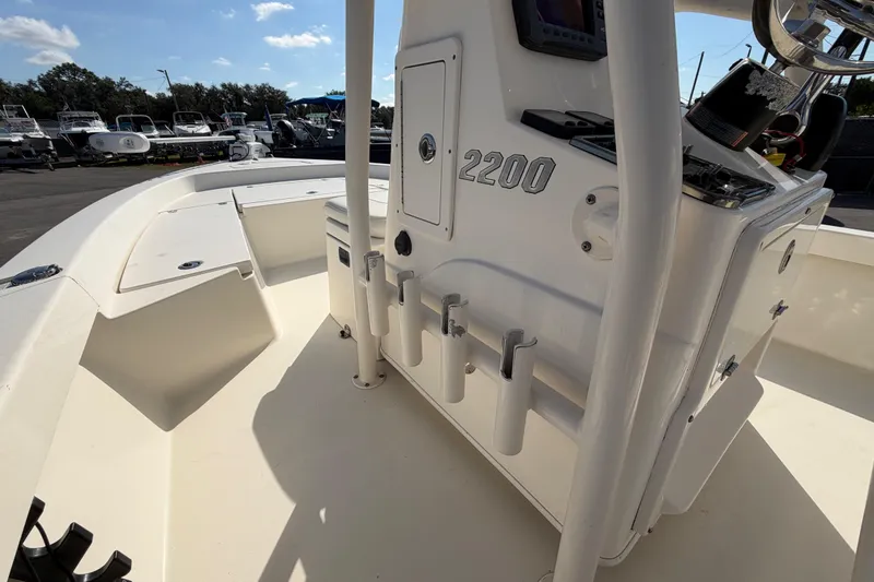 Slide: The Image of Open storage compartment on a 2015 Pathfinder 2200 TRS boat, showing interior details. - 35