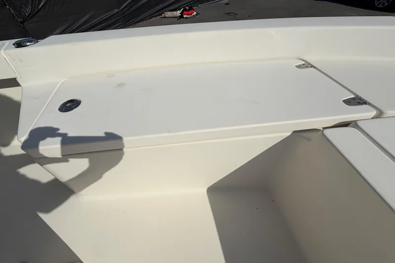 Slide: The Image of 2015 Pathfinder 2200 TRS storage compartment with rod holders, interior view. - 41