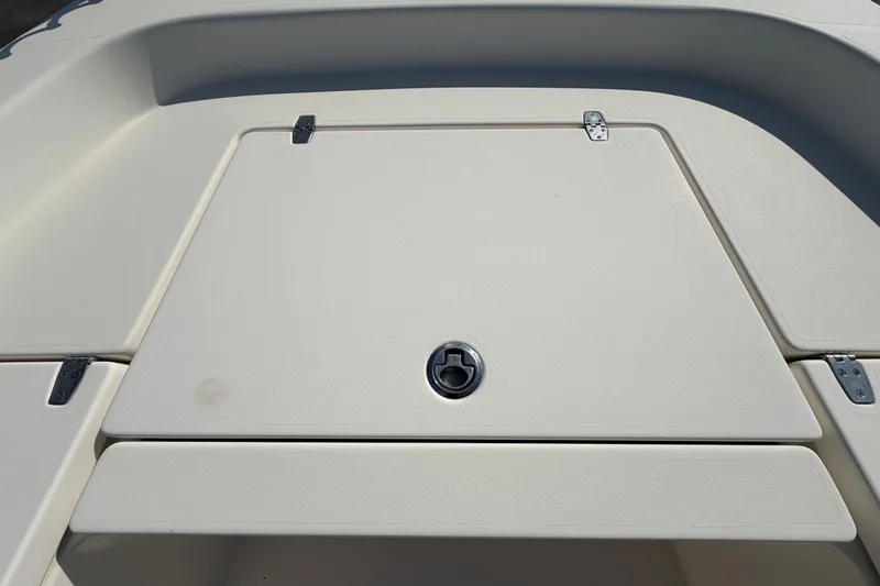 Slide: The Image of Open storage compartment on 2015 Pathfinder 2200 TRS boat, showing anchor and rope. - 44