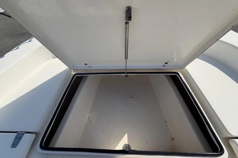 Slide: The Image of Anchor storage compartment in a 2015 Pathfinder 2200 TRS boat with rope and wiring. - 45