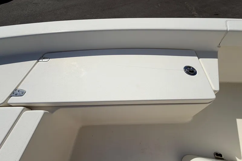 Slide: The Image of 2015 Pathfinder 2200 TRS boat displayed outdoors, showcasing spacious deck and seating. - 47