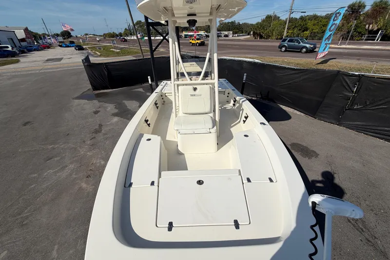 Slide: The Image of 2015 Pathfinder 2200 TRS boat interior with steering wheel and controls. - 56