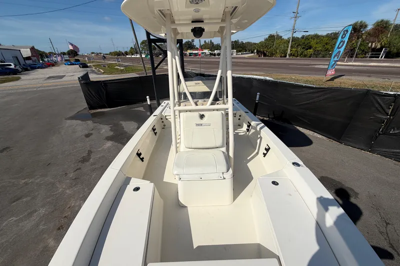 Slide: The Image of Open compartment of a 2015 Pathfinder 2200 TRS boat showing wiring and components. - 58