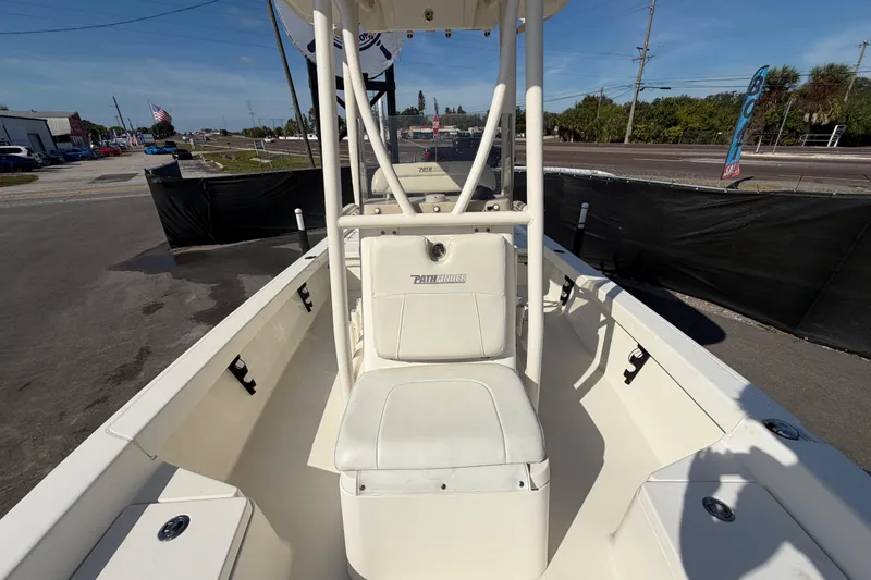 Slide: The Image of 2015 Pathfinder 2200 TRS boat deck with Yamaha 200 engine, storage compartments visible. - 60