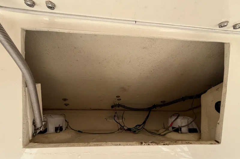 Slide: The Image of Open hatch on 2015 Pathfinder 2200 TRS boat showing internal components. - 67