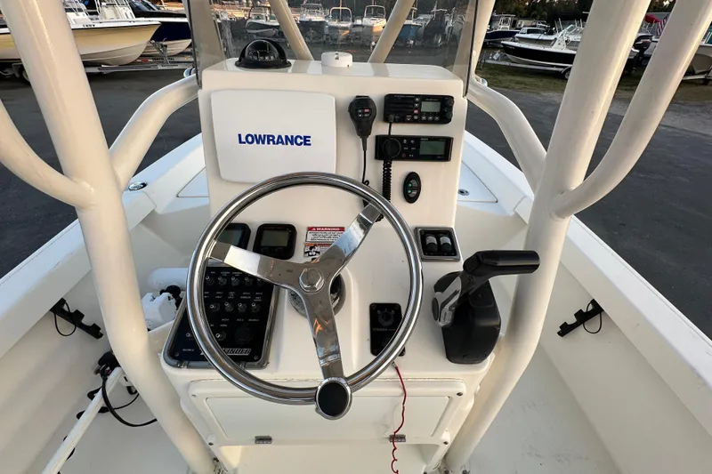 Slide: The Image of 2015 Pathfinder 2200 TRS boat with Yamaha 200 engine, parked on a trailer. - 7