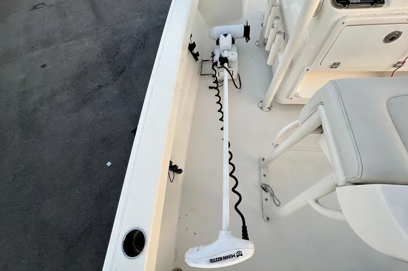 Slide: The Image of 2015 Pathfinder 2200 TRS boat with Yamaha engine on trailer, parked outdoors. - 8