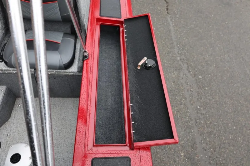 Slide: The Image of 2022 Tracker Targa V-19 Combo Tournament Edition boat with open storage compartment. - 31