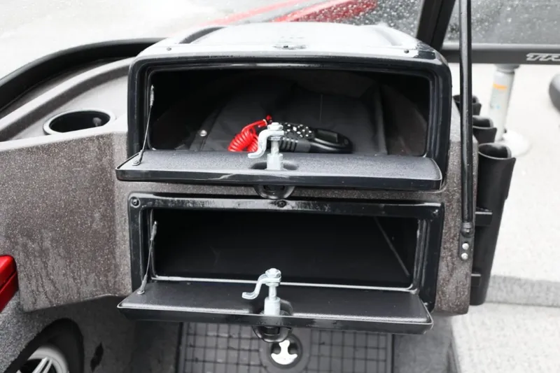 Slide: The Image of 2022 Tracker Targa V-19 Combo Tournament Edition storage compartments with safety equipment. - 44