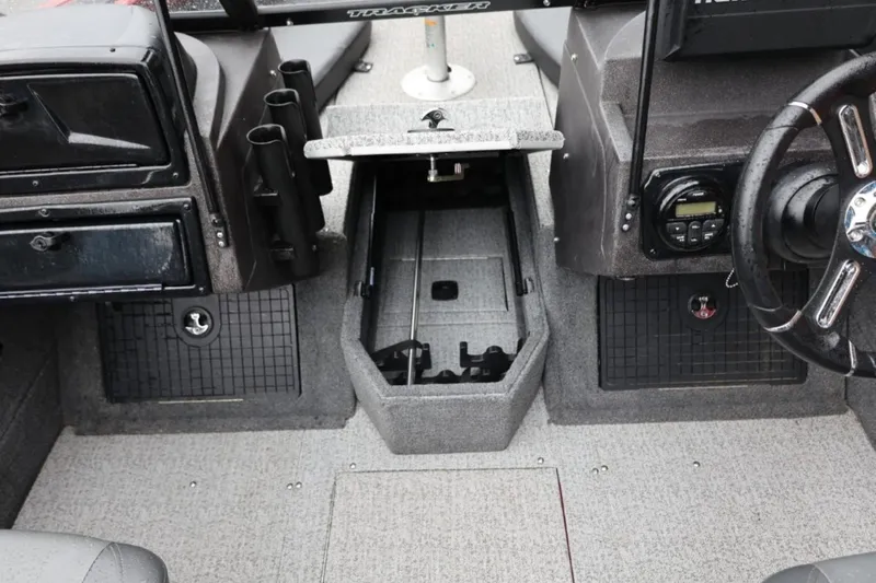 Slide: The Image of 2022 Tracker Targa V-19 Combo Tournament Edition boat interior with storage compartments. - 51