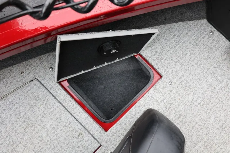 Slide: The Image of Open storage compartment in 2022 Tracker Targa V-19 Combo Tournament Edition boat. - 56
