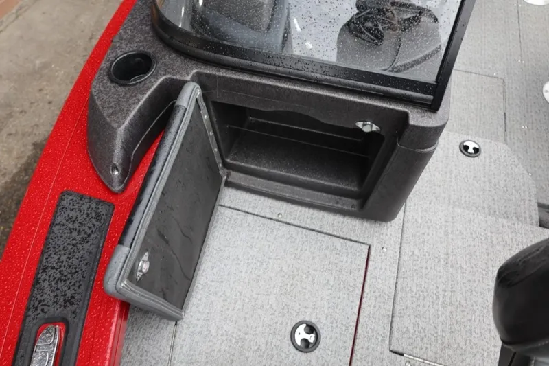 Slide: The Image of 2022 Tracker Targa V-19 Combo Tournament Edition boat interior with open storage compartment. - 60