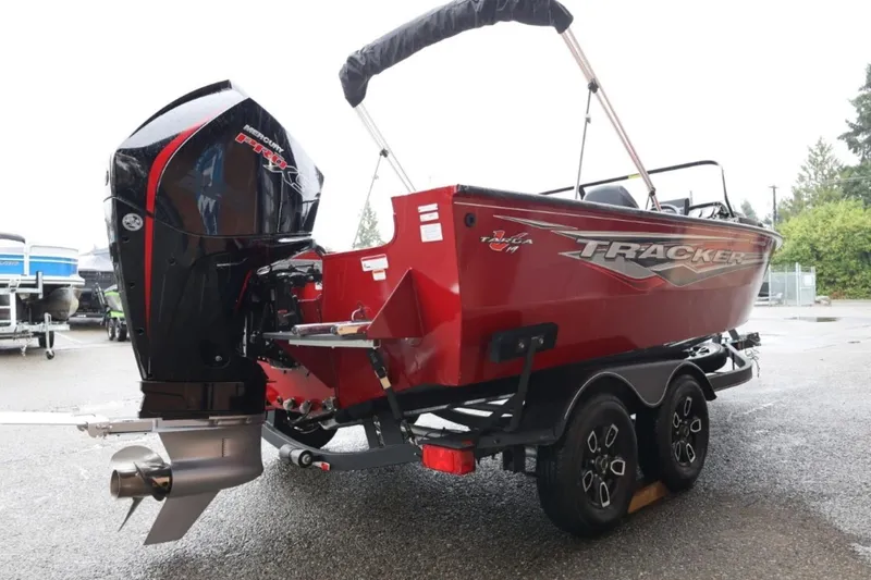 Slide: The Image of 2022 Tracker Targa V-19 Combo Tournament Edition boat with powerful outboard motor. - 8