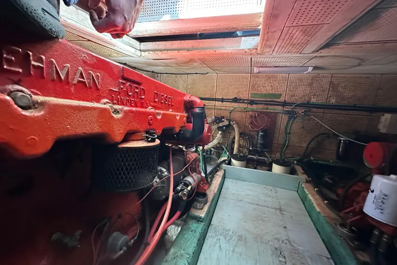 Slide: The Image of Engine room of 1979 Marine Trader 38DC with Ford Lehman diesel engine. - 55