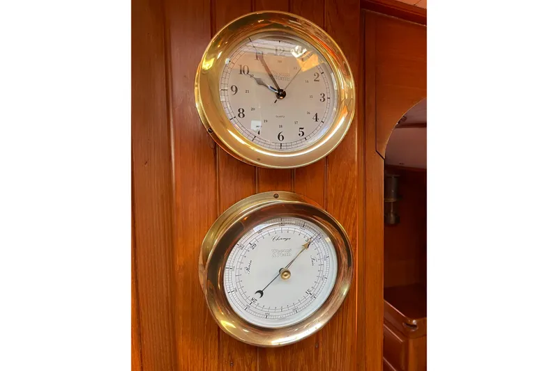 Slide: The Image of Brass clock and barometer on wooden panel, Passport 40 yacht, 1985 model. - 20