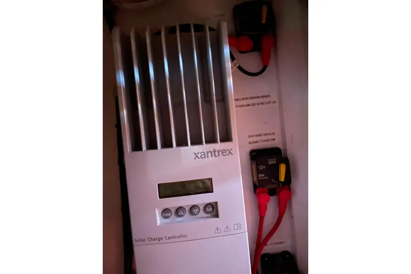 Slide: The Image of Xantrex solar charge controller in Passport 40, 1985 model, with wiring connections. - 37