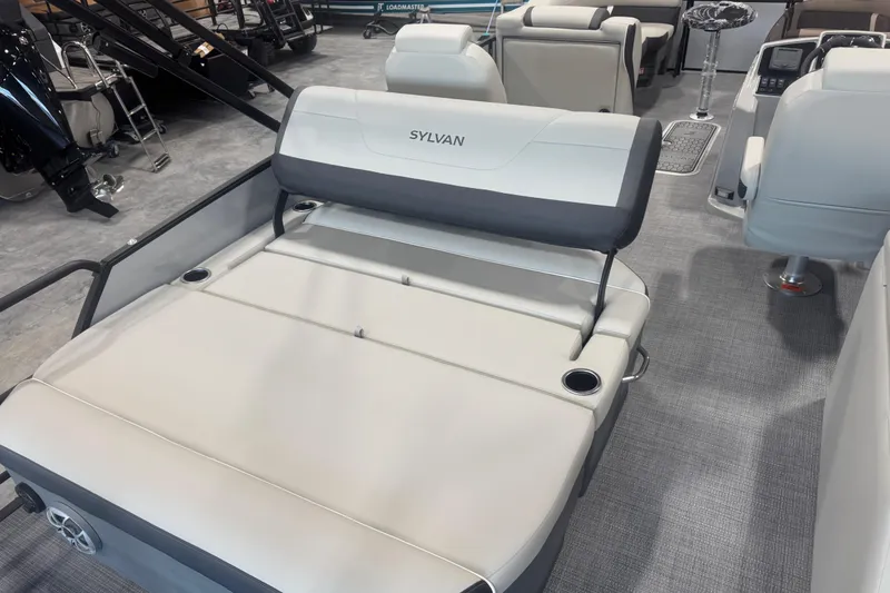 Slide: The Image of 2026 Sylvan Mirage X X5 boat interior with plush seating and modern design. - 15