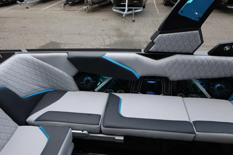Slide: The Image of 2022 Tigé 24RZX boat interior with modern seating and stylish upholstery design. - 11