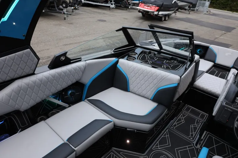Slide: The Image of 2022 Tigé 24RZX boat interior with modern seating and stylish design. - 12