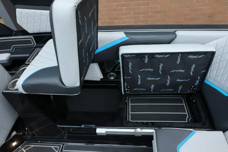 Slide: The Image of 2022 Tigé 24RZX boat interior with stylish seating and modern design elements. - 15