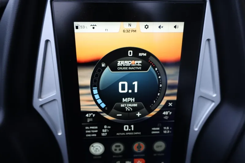 Slide: The Image of Dashboard display of 2022 Tigé 24RZX boat showing speed and cruise control settings. - 24