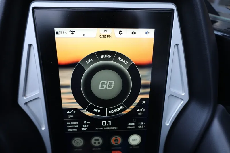 Slide: The Image of Touchscreen display of 2022 Tigé 24RZX boat showing ski, surf, and wake options. - 27