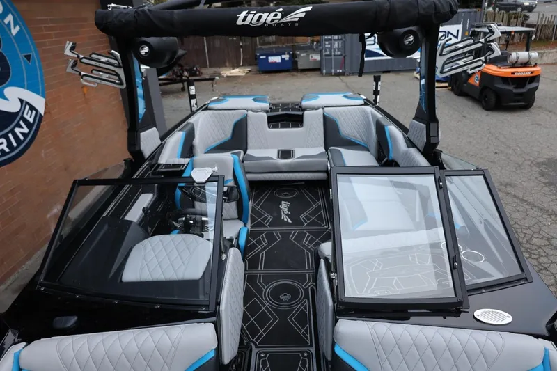 Slide: The Image of 2022 Tigé 24RZX boat interior with modern seating and sleek design. - 41