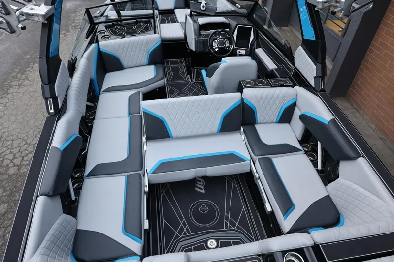 Slide: The Image of 2022 Tigé 24RZX boat interior with modern seating and sleek design. - 42
