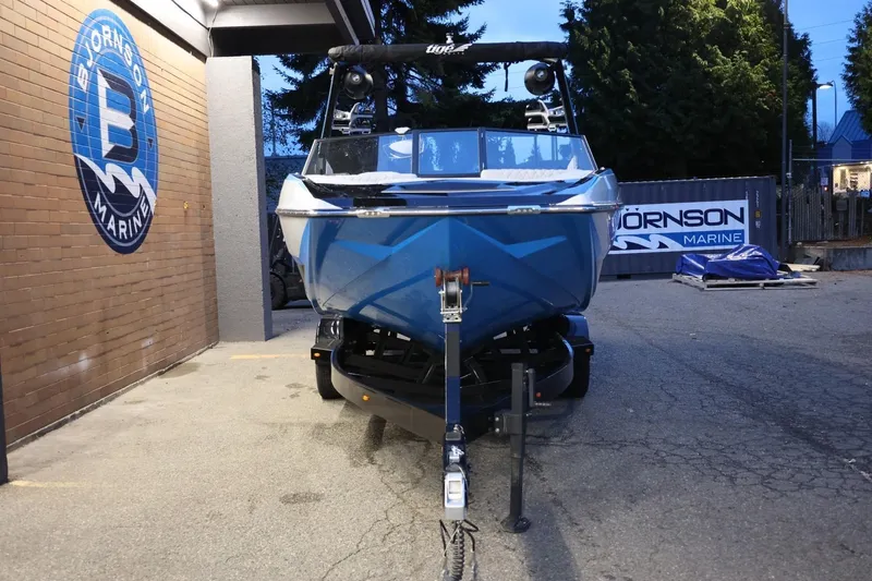 Slide: The Image of 2022 Tigé 24RZX boat at Bjornson Marine dealership, front view. - 54