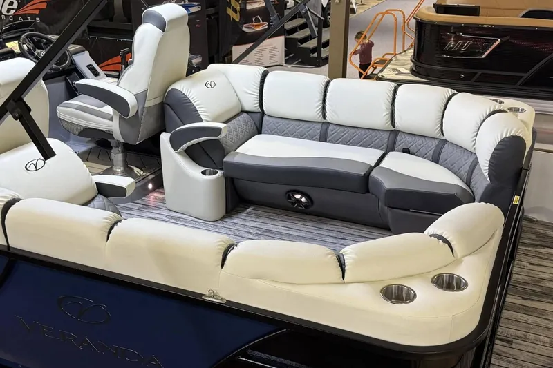 Slide: The Image of Luxurious seating on 2025 Veranda Relax VR 22 RC pontoon boat, featuring plush upholstery. - 2