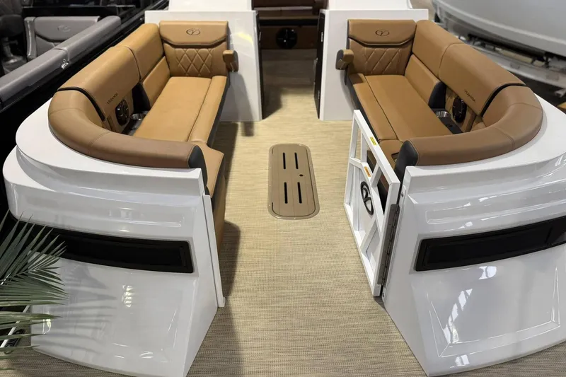 Slide: The Image of 2025 Veranda VX 25 DCVL boat interior with luxurious tan seating and modern design. - 1