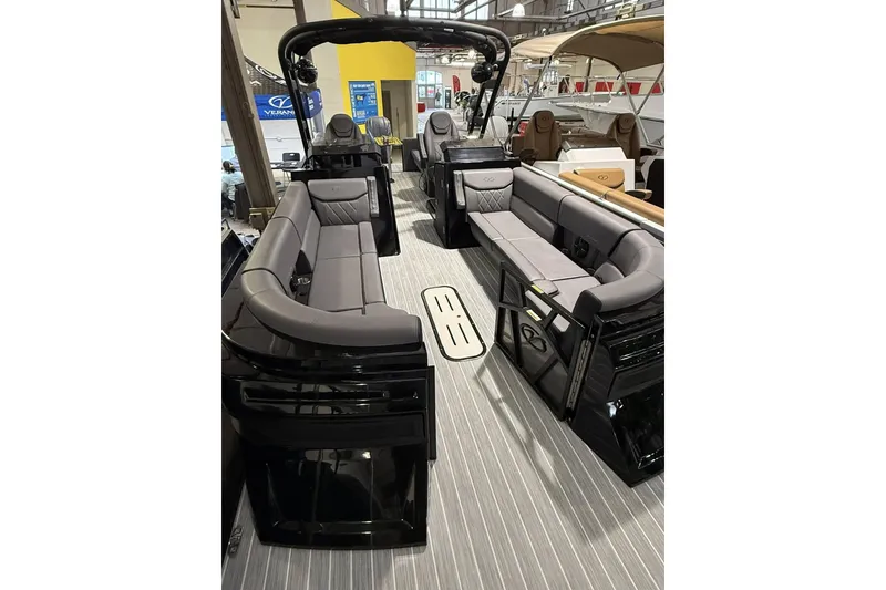 The Image of 2025 Veranda VX 27 DCRC luxury pontoon boat interior with sleek seating and modern design. - 0