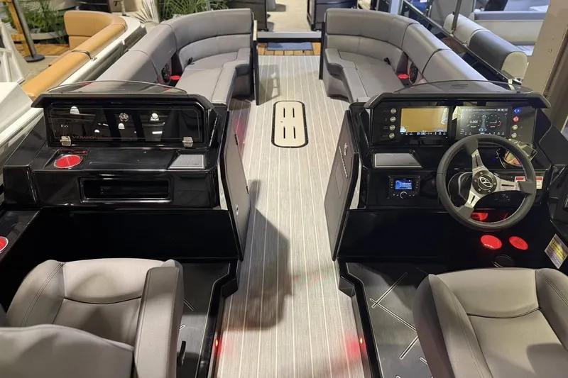 Slide: The Image of Interior of 2025 Veranda VX 27 DCRC boat with modern dashboard and seating. - 1