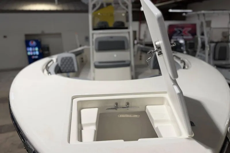 Slide: The Image of 2025 Defiance Catalina 240 boat interior with open storage compartment. - 10