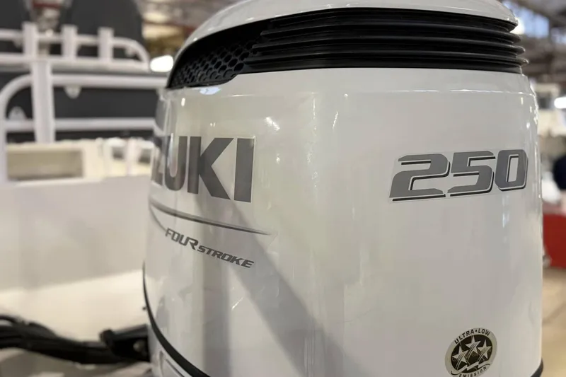 Slide: The Image of Suzuki 250 four-stroke outboard motor on 2025 Defiance Catalina 240 boat. - 11