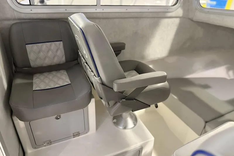 Slide: The Image of Interior seating of 2025 Defiance Admiral 220 EX boat, featuring modern design and comfort. - 10