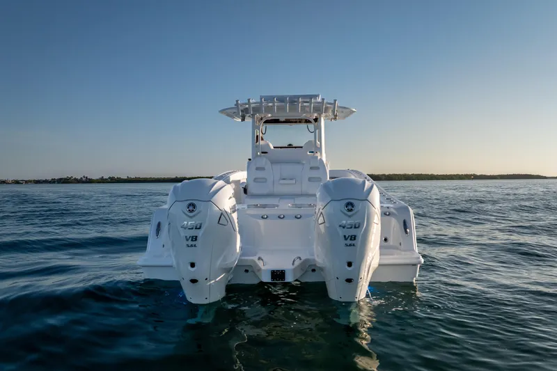 Slide: The Image of 2026 Freeman 35 boat with dual V8 engines on calm water. - 15