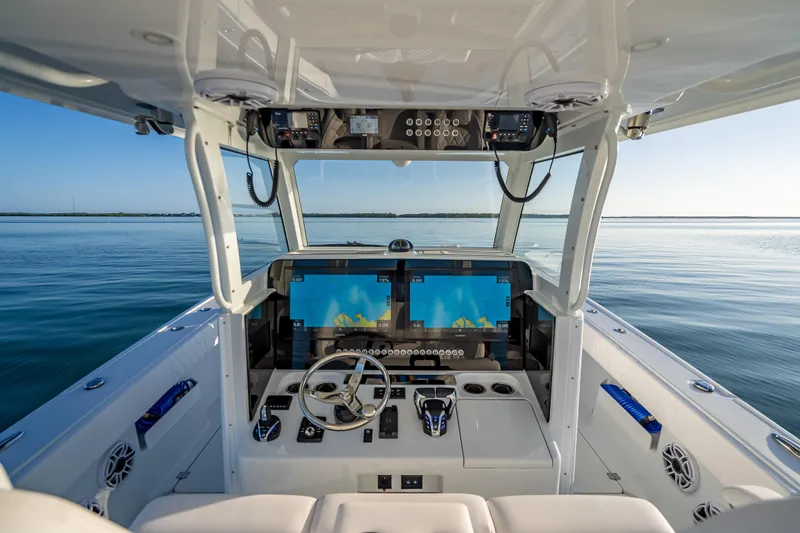 Slide: The Image of Interior view of 2026 Freeman 35 boat cockpit with advanced navigation system. - 18
